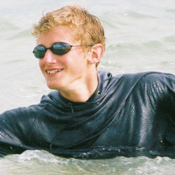 surf swimming in a hoodie